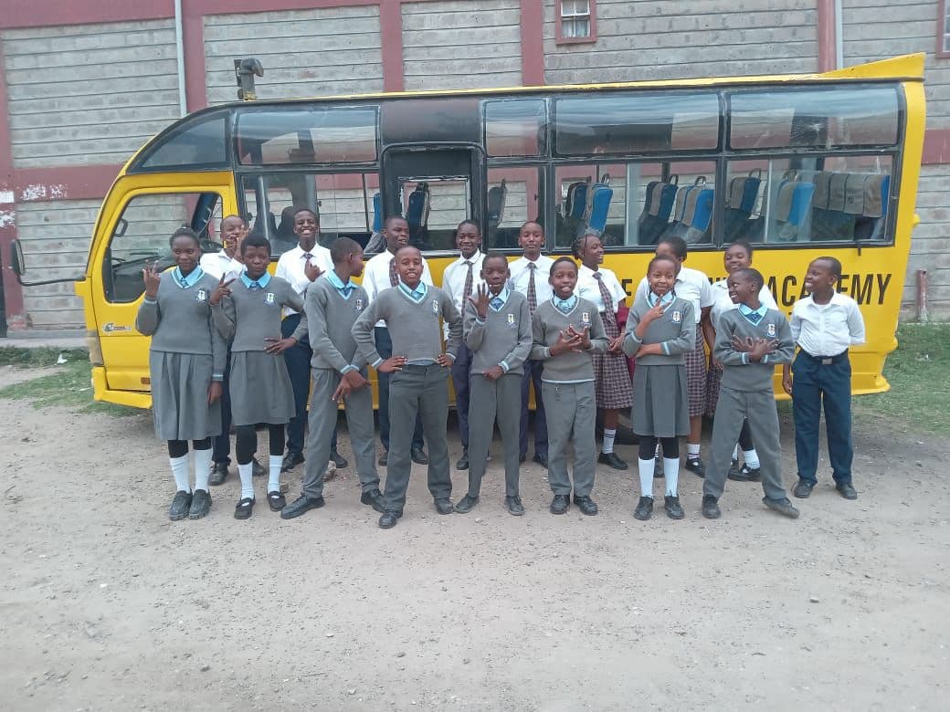 Pupils infront of bus